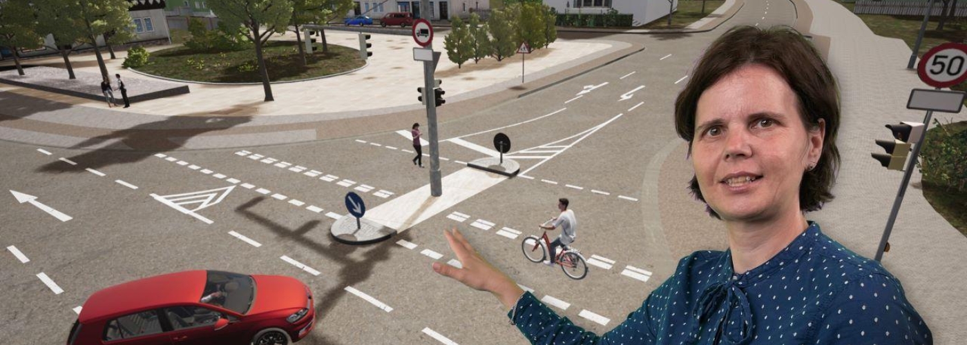 Frau präsentiert Verkehrssituation auf Bildschirm